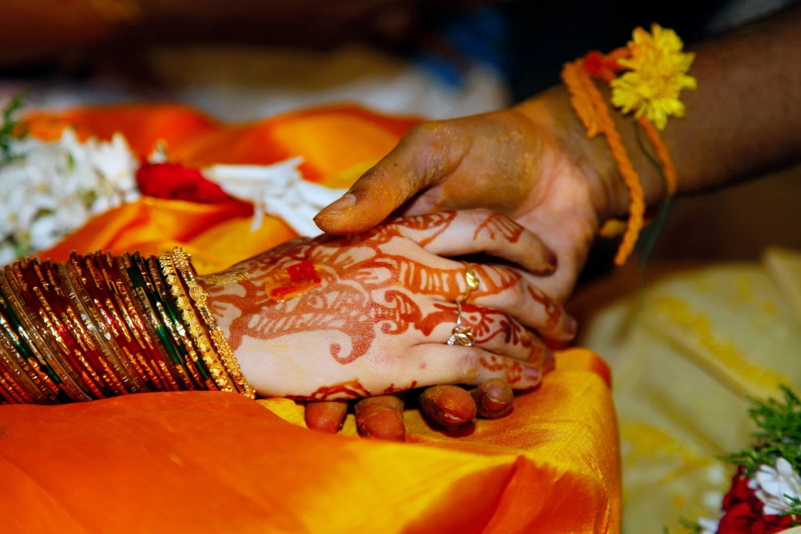 Hands joined during a wedding ceremony